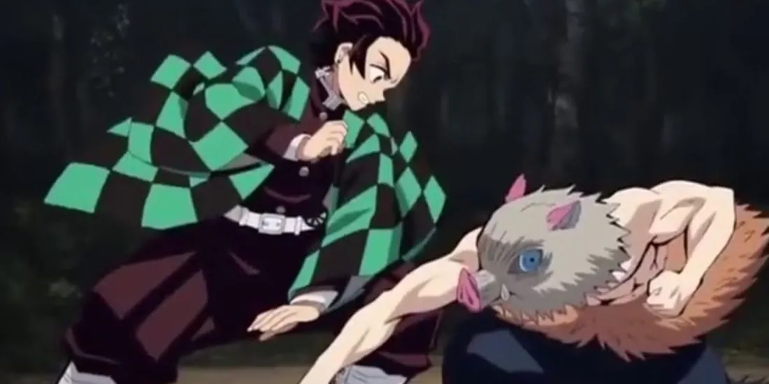 Inosuke Hashibira thách thức Tanjiro Kamado trong Demon Slayer
