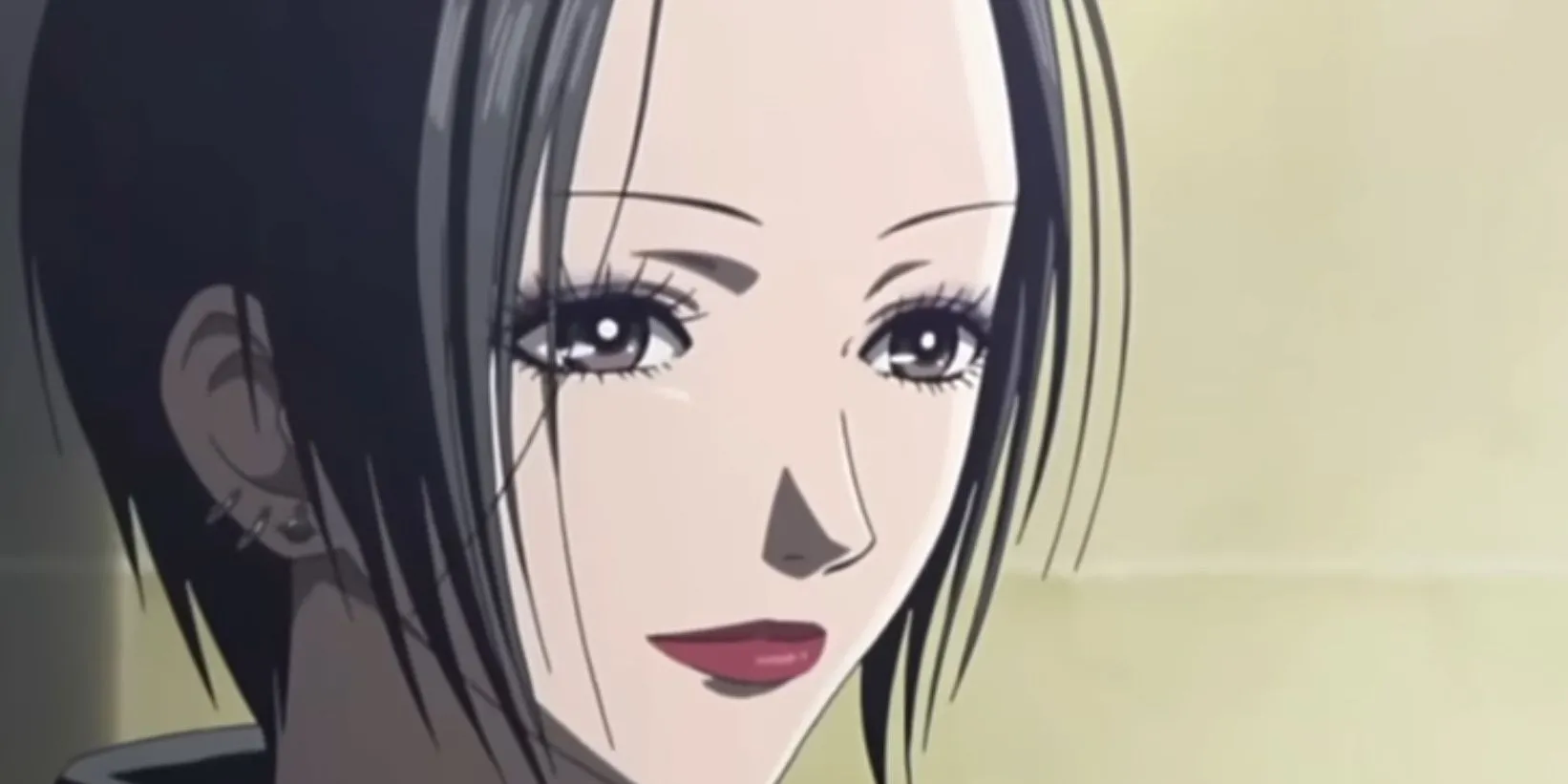Nana Osaki từ anime Nana với phong thái mạnh mẽ và ánh mắt kiên định, phản ánh quyết định khó khăn trong tình yêu