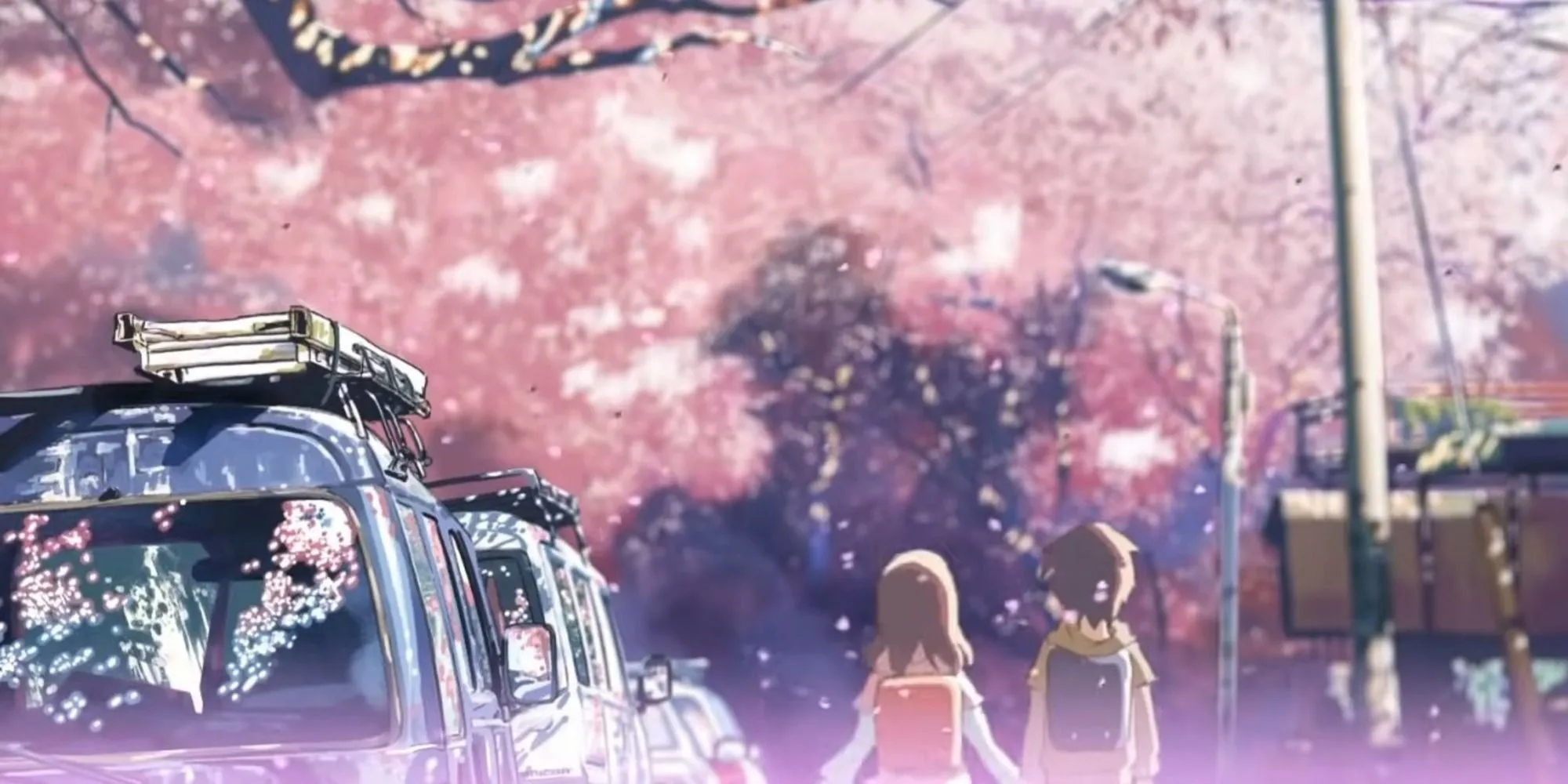 Takaki và Akari bước qua nhau gần đường ray xe lửa trong 5 Centimeters Per Second