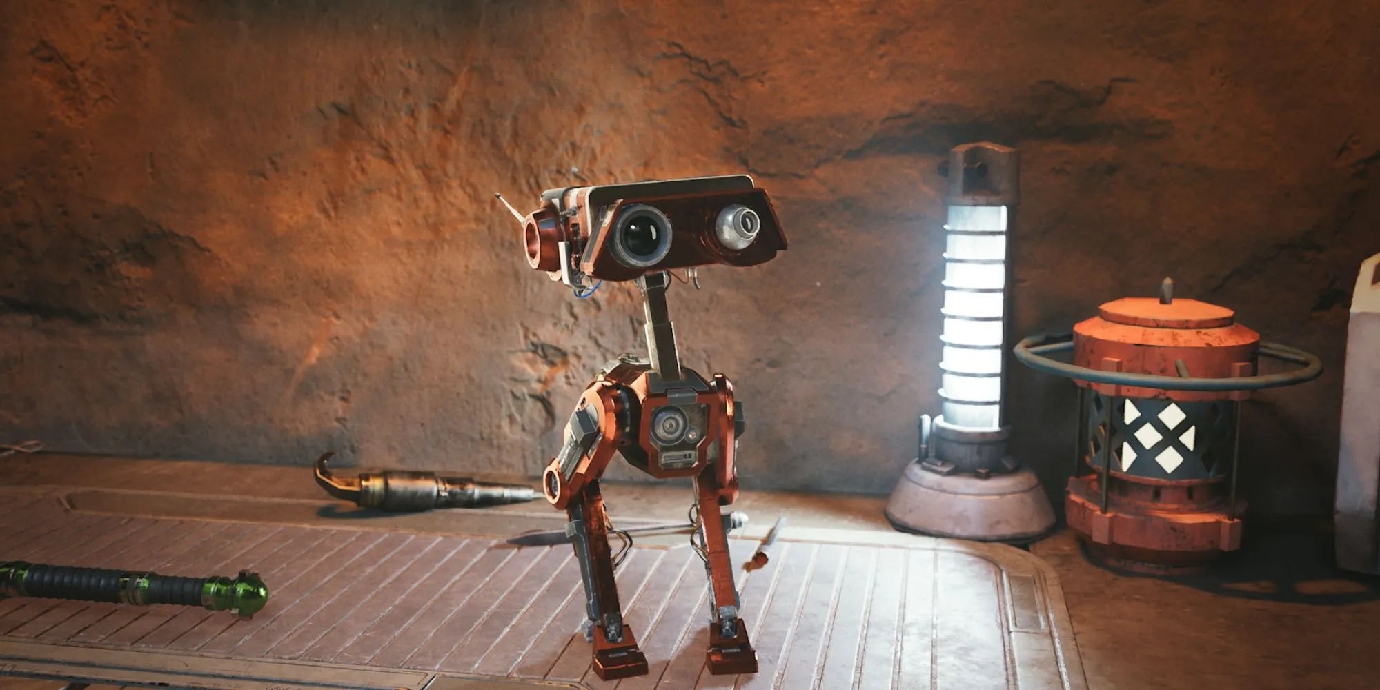 BD-1, droid đồng hành trung thành của Cal Kestis, trên bàn làm việc trong Star Wars Jedi: Survivor.