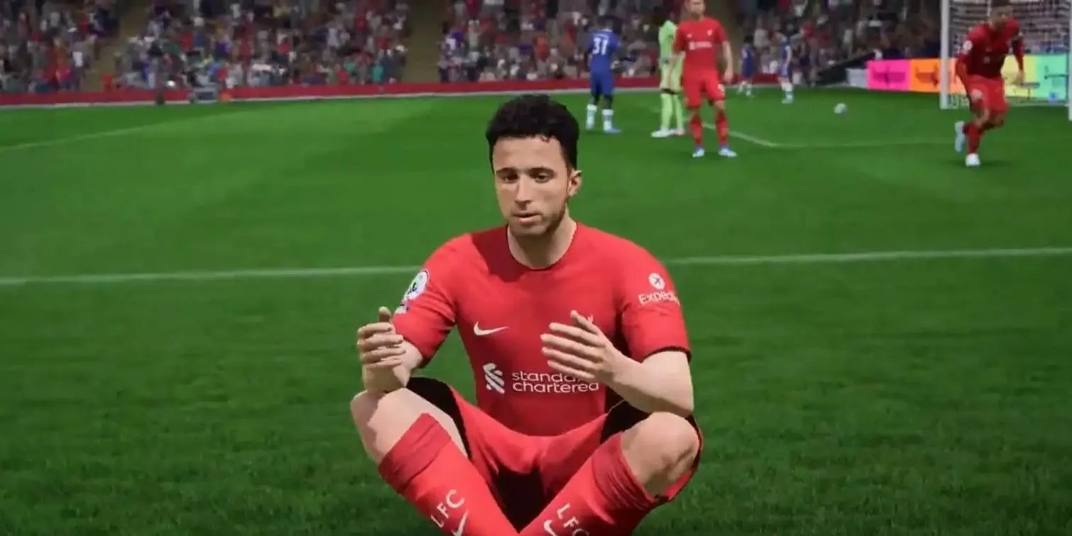 Cầu thủ Diogo Jota ăn mừng bàn thắng với điệu bộ đặc trưng của mình trong FIFA 23, biểu tượng cho mối liên kết giữa bóng đá thực tế và thế giới ảo, một chi tiết được nhà phát triển EA FC 26 cân nhắc tri ân.