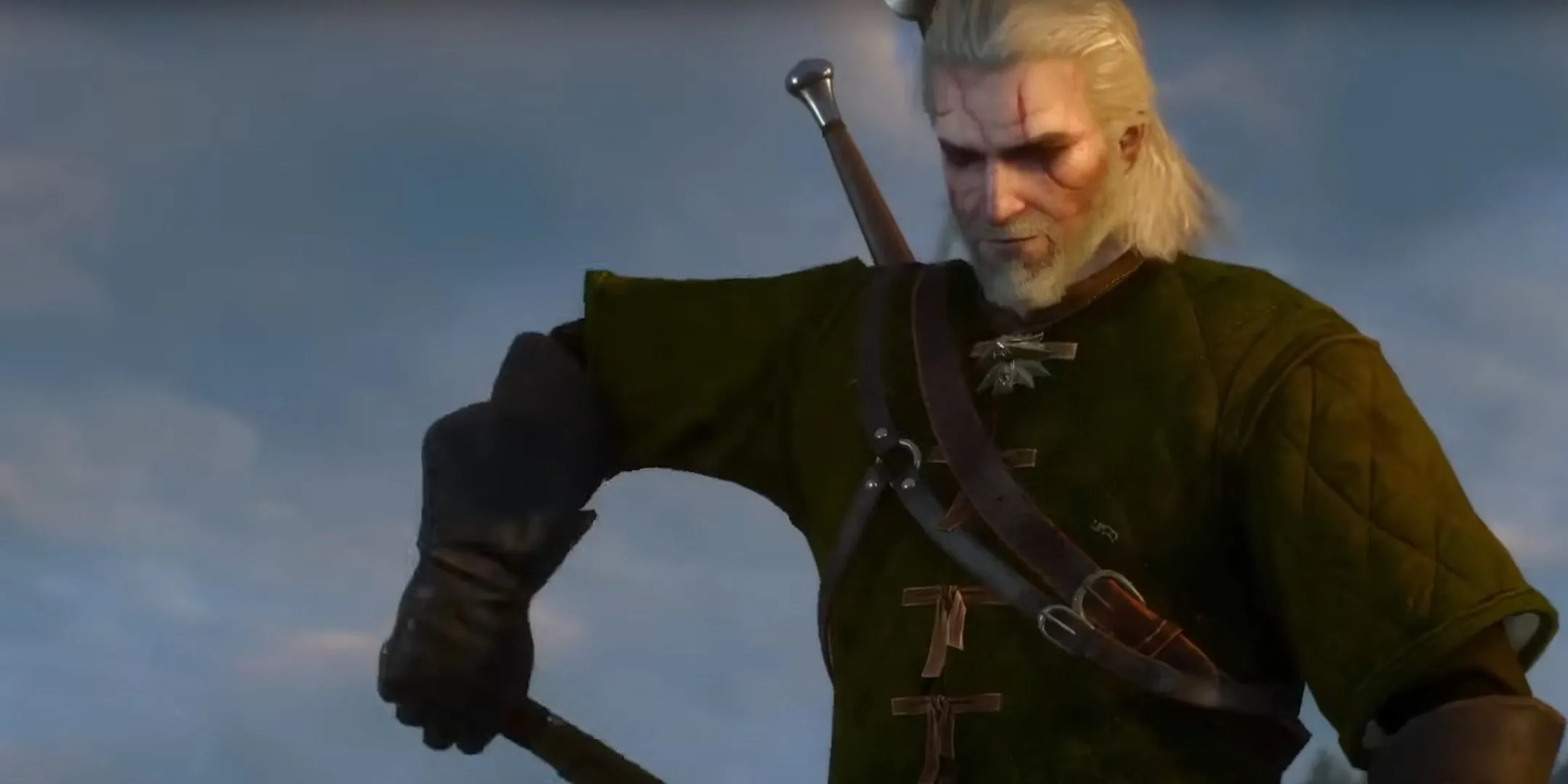 Geralt của Rivia cầm chiến lợi phẩm Griffin trong The Witcher 3: Wild Hunt, biểu tượng cho xu hướng giải quyết mọi vấn đề của người yêu bằng sức mạnh vật chất mà không cần sự đồng thuận.