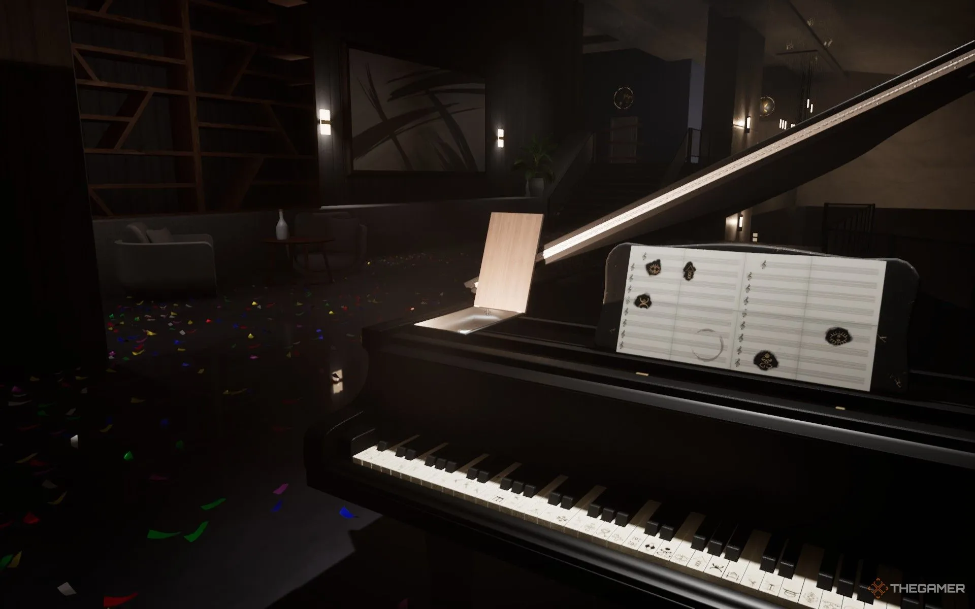 Người chơi đang lấy băng cassette từ ngăn bí mật của cây đàn piano trong Dead Take sau khi giải mã thành công câu đố nốt nhạc, tiến gần hơn đến sự thật.