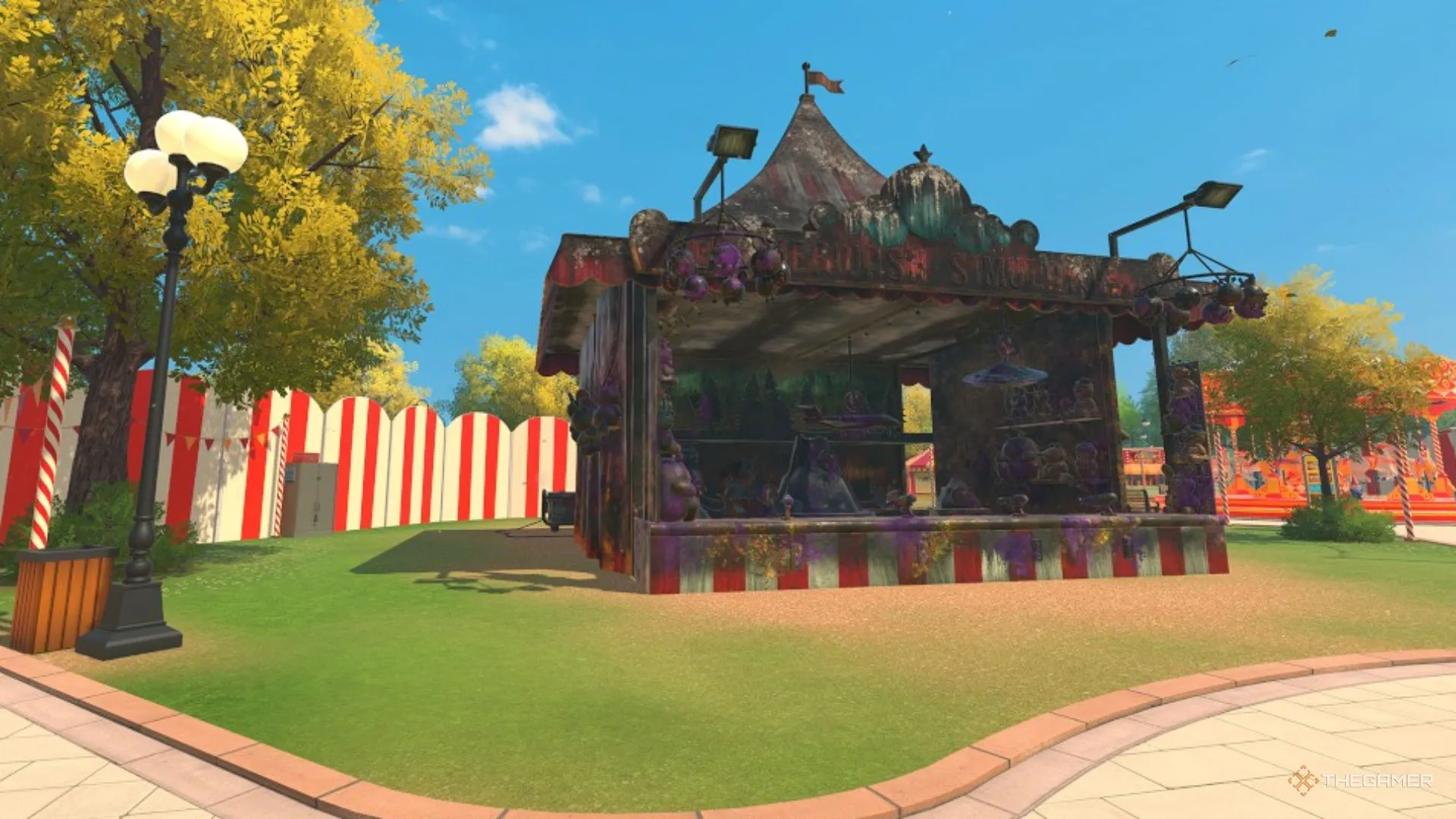 Gian hàng bắn súng hội chợ bẩn đứng cô lập giữa công viên