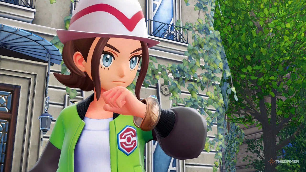 Nhân vật chính khoe chiếc Mega Bracelet trong Pokemon Legends: Z-A, biểu tượng của hệ thống tiến hóa và trang bị trong game.