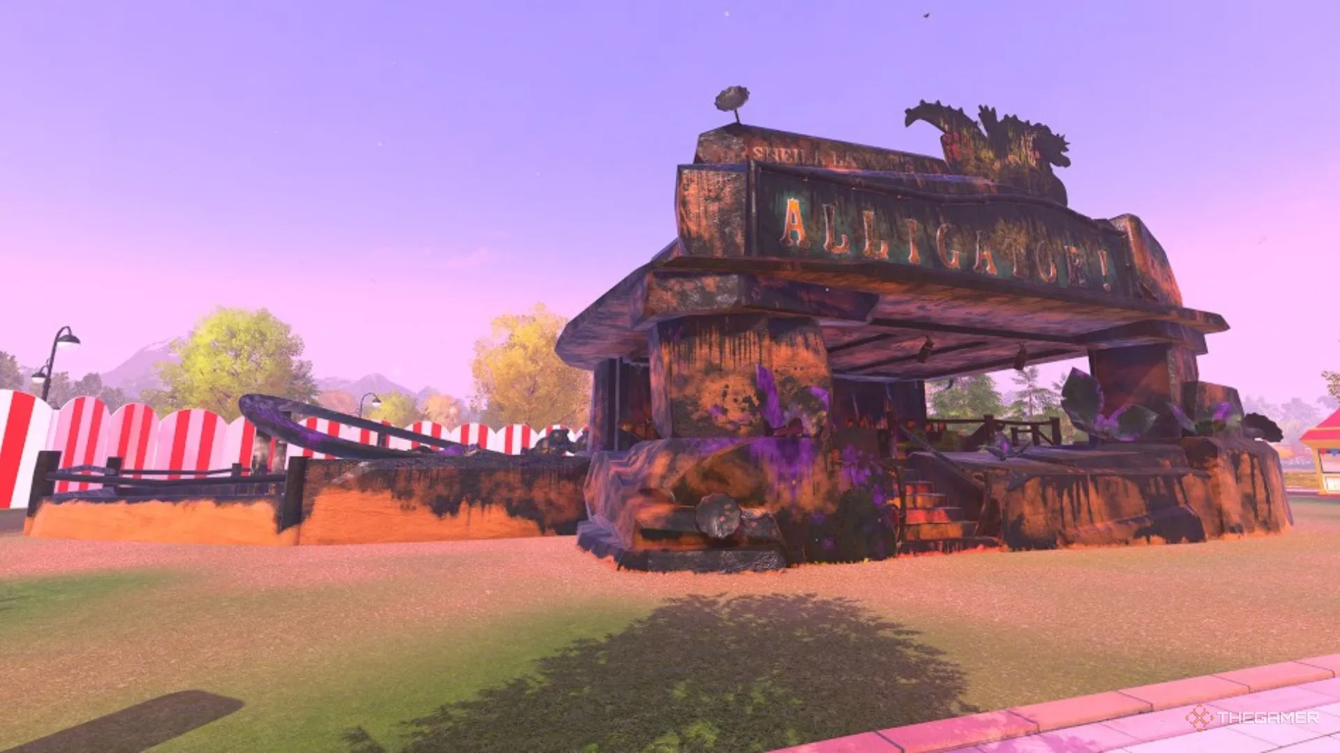 Tàu lượn mini chủ đề cá sấu phủ đầy vết bẩn trên kết cấu