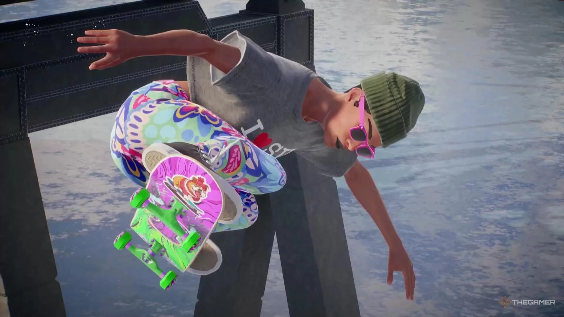 Vận động viên trượt ván mặc quần màu sắc, kính hồng thực hiện động tác nhảy trên mặt nước trong Skate, đại diện cho tính thẩm mỹ sự kiện.